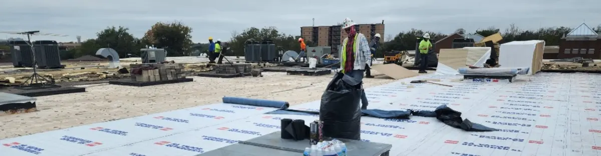 Commercial roof maintenance on a flat roof in Central Texas