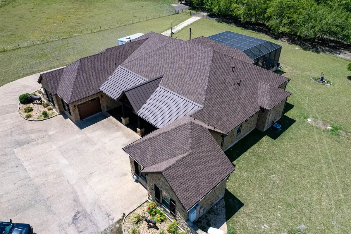 Aerial view of a Georgetown home with a new roof by Texas Traditions Roofing