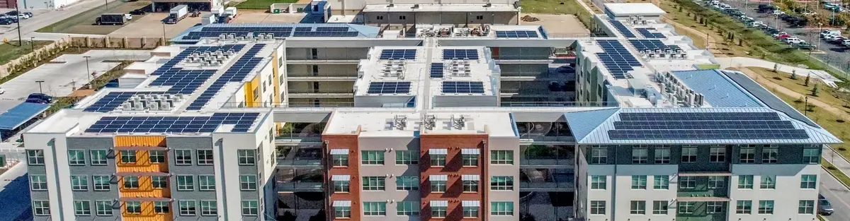 Aerial view of a multifamily roofing project by Texas Traditions Roofing in Central Texas