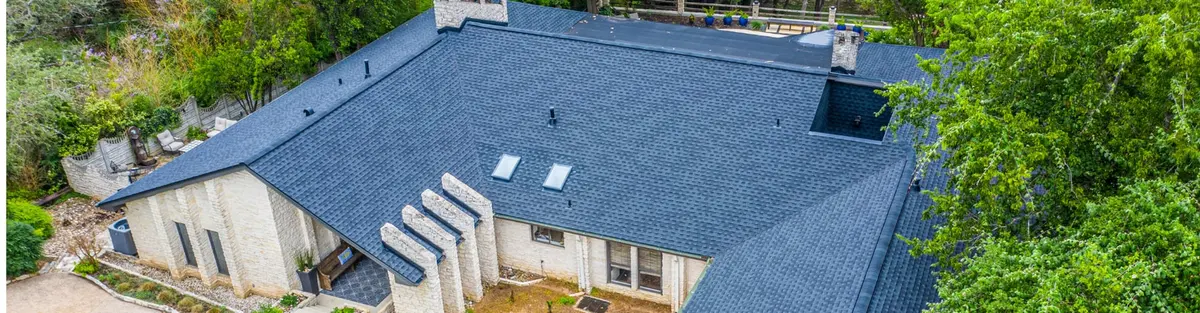 Close view of a roof surface against the Texas sky