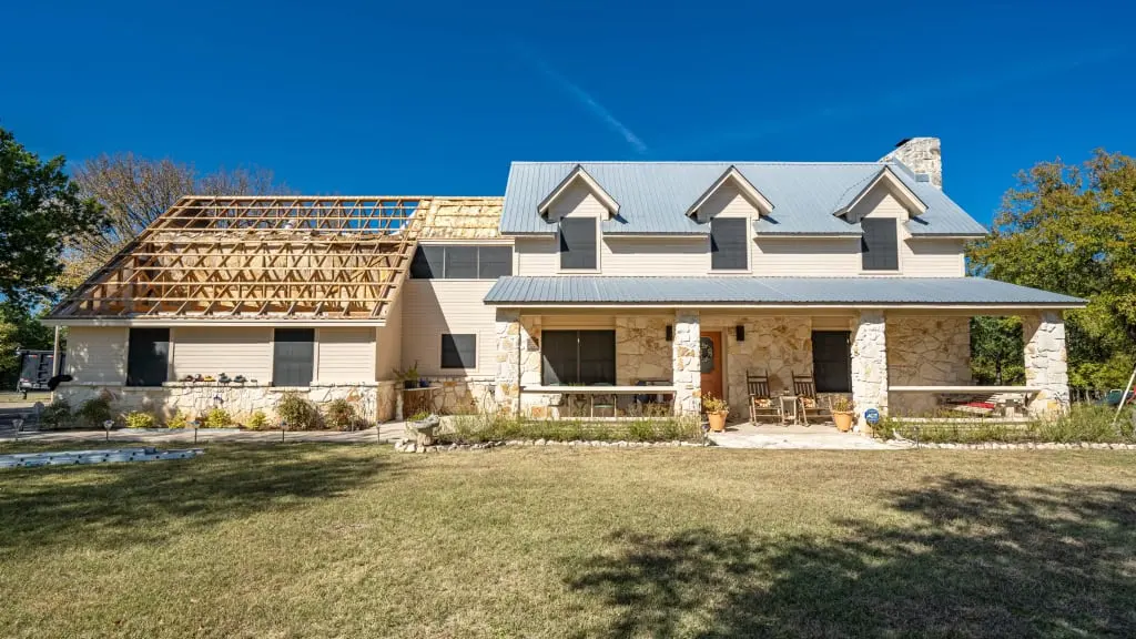 Standing seam metal roof installation on a Georgetown home